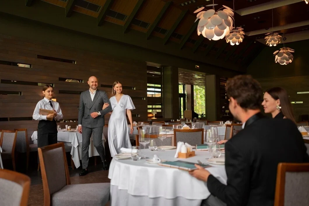 Guests enjoying a celebration in a styled event hall